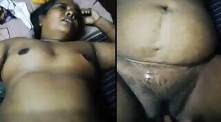 Mature Indian XXX aunt jerks her pussy with fingers on camera MMS